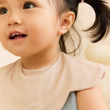 Cuddle Petal Bib in Cotton Cream