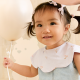 Cuddle Petal Bib in Mon Chérie Cherries